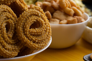 Indian Traditional Tea Time Snack Chakli, a deep fried snack, It is known as Chakali, Murukku, Muruku, Murkoo, Chakri.