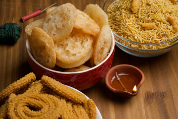 Anarsa which is an authentic sweet pastry-like snack especially made in the festive season like Diwali in Maharashtra and Bihar, selective focus