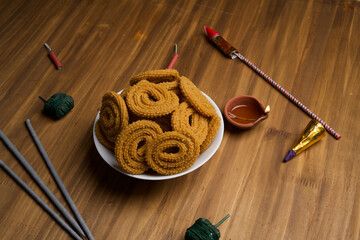 Indian Traditional Tea Time Snack Chakli, a deep fried snack, It is known as Chakali, Murukku, Muruku, Murkoo, Chakri.