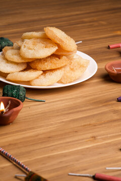 Anarsa which is an authentic sweet pastry-like snack especially made in the festive season like Diwali in Maharashtra and Bihar, selective focus