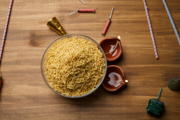 Indian spicy snacks Namkeen - Bikaneri Besan sev made with chickpea flour (Besan), side view.
