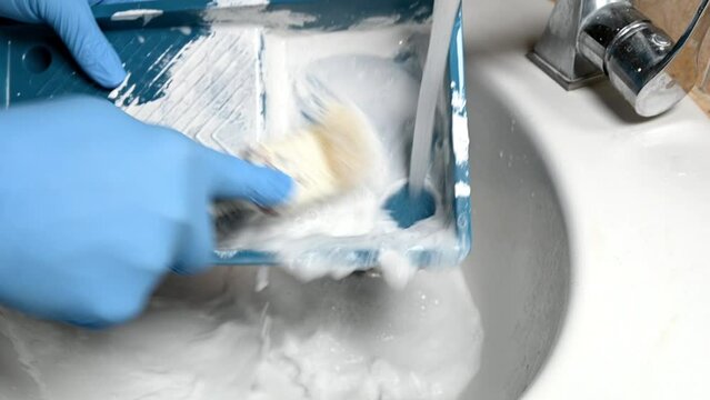 washing of painting equipment in bathroom basin