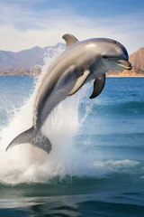 Raamstickers A dolphin jumping out of the water, action shot, high-speed  vertical photography © Nino Lavrenkova