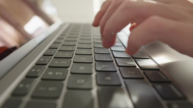 Knowledge search: Person searches for information on Internet using computer to acquire knowledge and development. Student studies remotely, writes a scientific paper. Online learning via the Internet