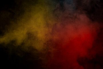 Blue and yellow steam on a black background.