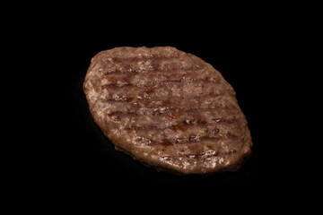 Cutlet with minced beef isolated on  black background.