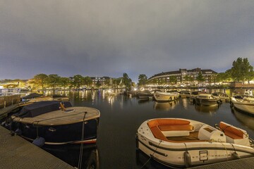 View over a typical canal in the Dutch metropolis Amsterdam in summer 2023