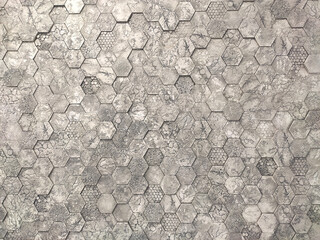 Grey hexagon marble tiles with white grout, Seamless interior decoration background.