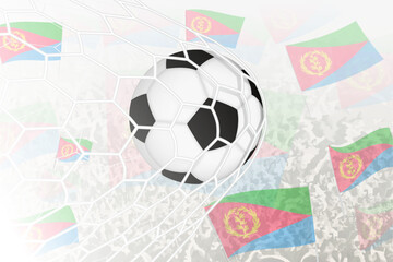 National Football team of Eritrea scored goal. Ball in goal net, while football supporters are waving the Eritrea flag in the background.
