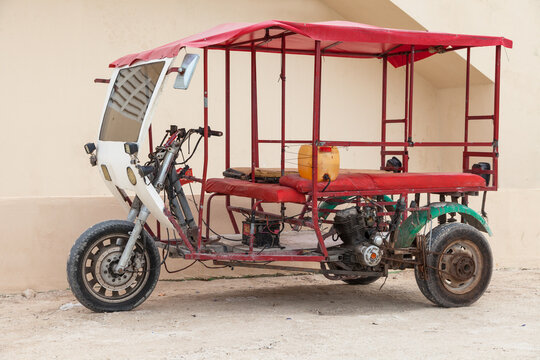 Selfmade Mototaxi in Yucatan, Mexico. 
A Motorbike cut in half a a DIY improvised taxi was build out of available parts.