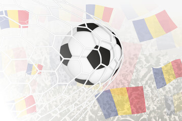 National Football team of Romania scored goal. Ball in goal net, while football supporters are waving the Romania flag in the background.