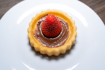 Cake with a strawberry and chocolate cream