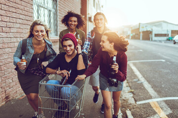 Playful friends enjoying an urban sunset adventure