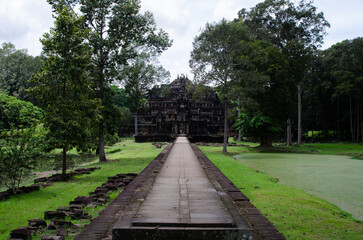 Ancient Buddhist Temple Ruins of Angkor Wat in Siem Reap, Cambodia. Stone Path To The Temple.