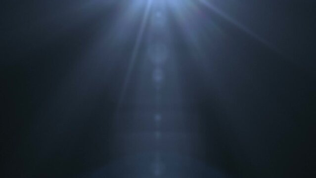 Cinematic lens flares effects. Explosion flash lights optical lens flare transition. Beautiful abstract warm natural lighting on black background