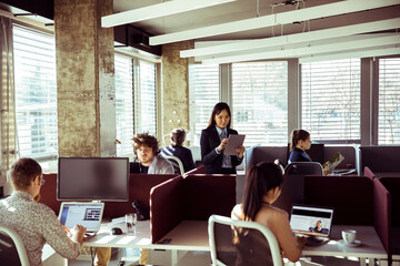 Diverse group of professionals working in a modern office setting