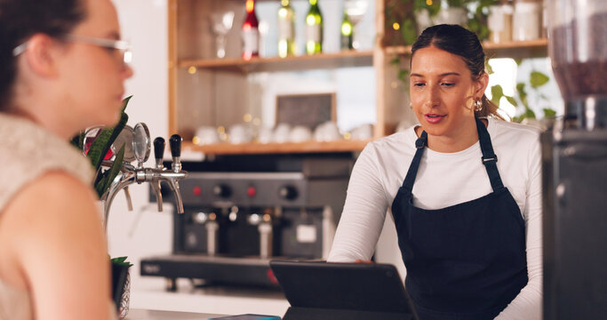 Women, barista or customer order at cafe for service, payment or order on counter at coffee shop. Serving, waitress or employee in small business restaurant helping a girl client at checkout or work