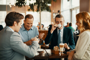 Group of professionals enjoying a coffee break together