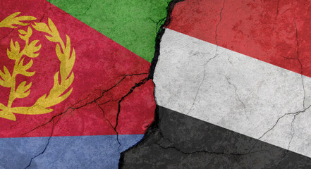 Eritrea and Yemen flags, concrete wall texture with cracks, grunge background, military conflict concept