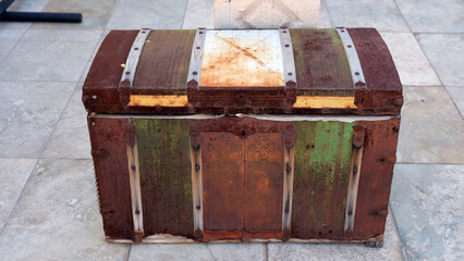 An old, rusty chest. a traditional object