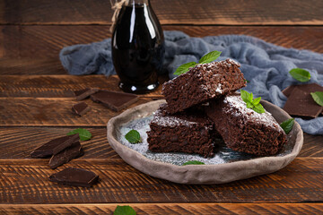 Delicious dessert chocolate banana brownie. Homemade bakery, brownie with mint leaves