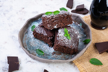 Delicious dessert chocolate banana brownie. Homemade bakery, brownie with mint leaves