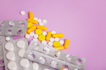 Assorted medicines: pills, capsules, blisters. Place for text, background, copyspace