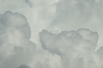 gray background, photo shows gray clouds close up