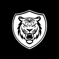 This fierce and powerful tiger mascot head logo, set within a shield, represents strength and competitiveness. Illustration in black and white colors