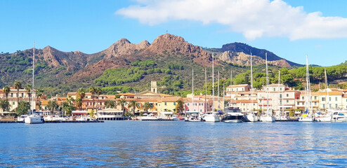 Panorama of the city of Porto Azzuro from the sea.