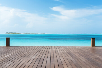 Fototapeta premium Wooden pier with blue sea and sky background