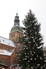 Riga, Latvia. Christmas Market On Dome Square With Riga Dome Cathedral. Christmas Tree And Trading Houses. Famous Landmark At Winter Xmas. Day, Christmas tree.