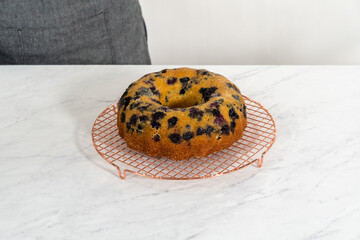 Lemon blueberry bundt cake with powdered sugar dusting