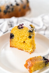 Lemon blueberry bundt cake with powdered sugar dusting