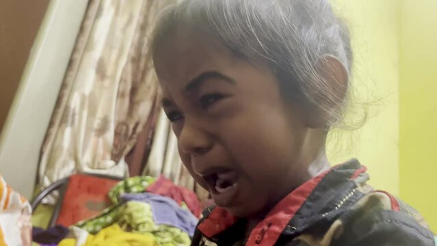 Kid was crying after getting scolded by the father