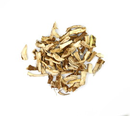 herbal medicine - dry ingredient chicory root, for the preparation of medicinal broth in a cup, isolated, white background