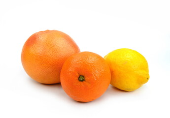 Fresh juicy citrus fruits isolated on white background