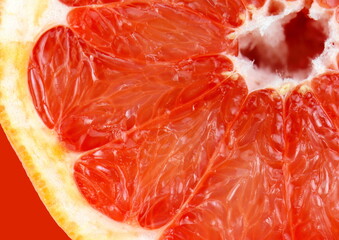 Top view of grapefruit slice, as background. Macro of red grapefruit. fruit citrus grapefruit texture background