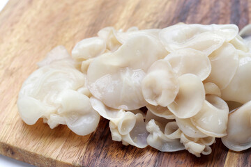 White jelly mushroom or white ear mushroom - obrazy, fototapety, plakaty