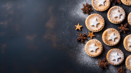 Delectable festive mince pies adorned with star-shaped pastry tops and sugar dust - 671279617