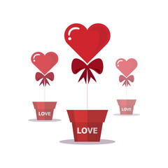 Heart-shaped balloons  tied with bow in pots. Valentine's Day gift.
