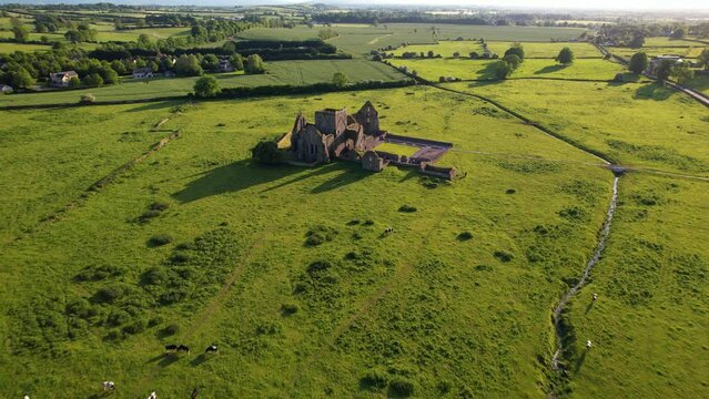 IRELAND- 8.27.2023 -Excellent aerial footage approaching Hore Abbey near the Rock of Cashel in Ireland.