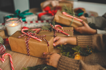 Naklejka na ściany i meble Christmas gift wrapping, creative activity