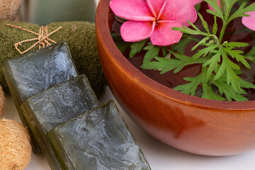 Take a shower, wash your face and hair with mugwort isolated on white background.