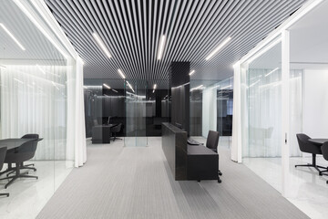 Modern office with striped ceiling design