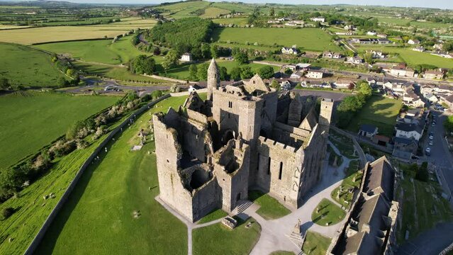 IRELAND- 8.27.2023 -Excellent aerial footage circling Ireland's Rock of Cashel on a sunny day.