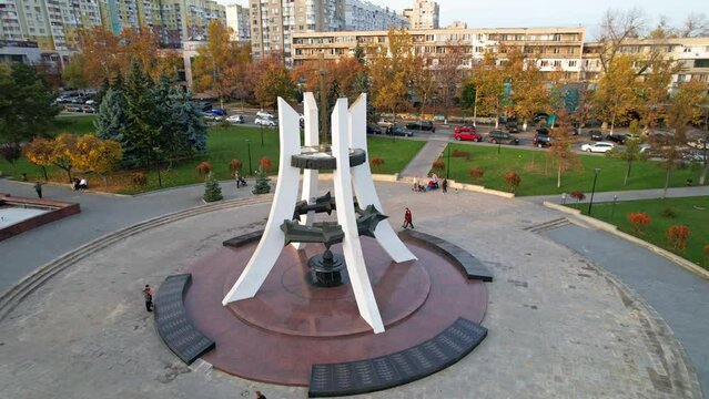 Panoramic aerial view of Afghanistan Park, unofficial name of park located in center of Rascani district, heart of which is Memorial Complex Sons of Fatherland ,Holy Remembrance. Chisinau, Moldova.4K