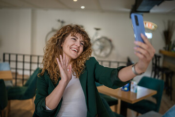 Woman use smartphone selfie photo self portrait or video call