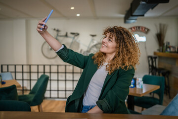 Woman use smartphone selfie photo self portrait or video call