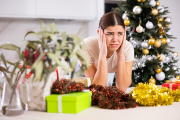 young woman upset by some circumstances of upcoming new year party